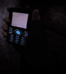 Black Mobile with blue keypad